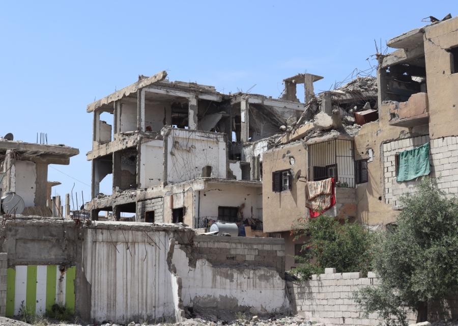 palazzo distrutto dalla guerra in siria