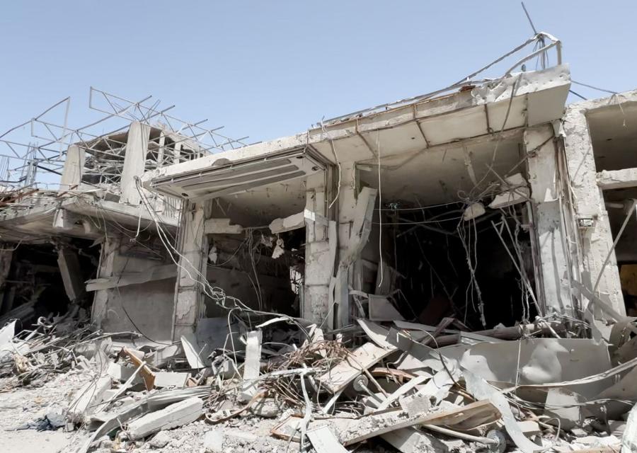 immagine di edificio distrutto da violenze nei Territori palestinesi occupati e israele